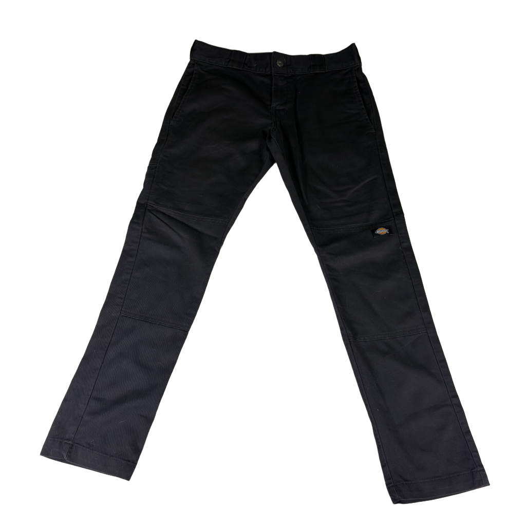 Black pants with WP811BK care label — front